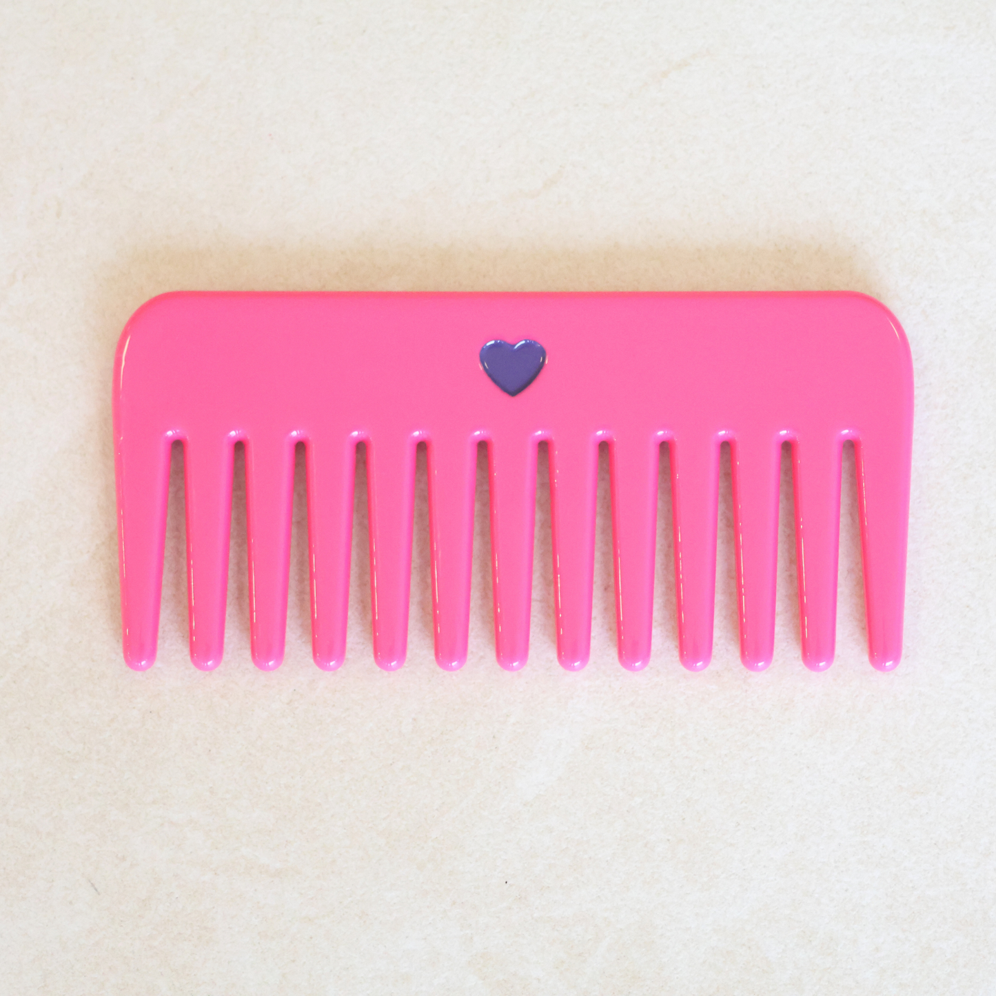 GIGI X BONTON MINI PEIGNE ROSE.