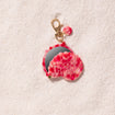Porte-clef miroir coquillage baisers