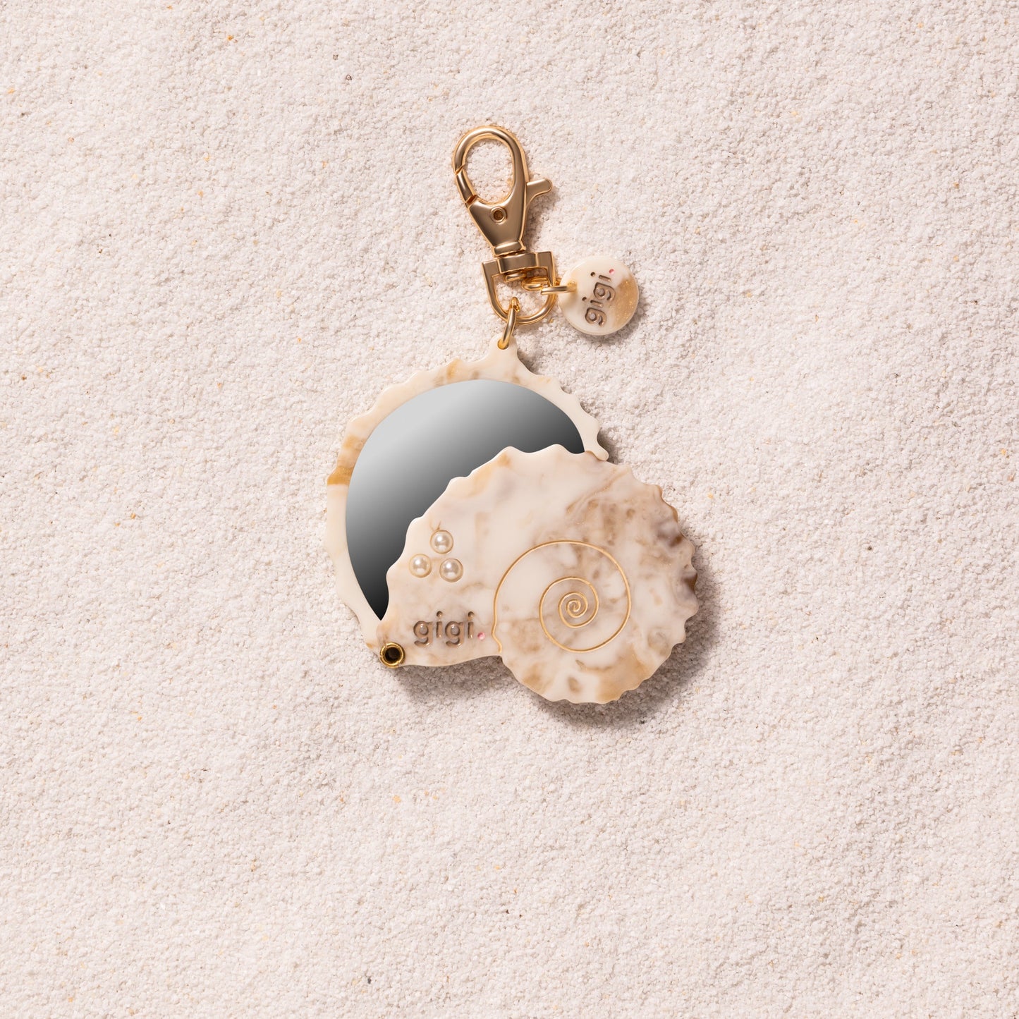 Porte-clef miroir coquillage dune