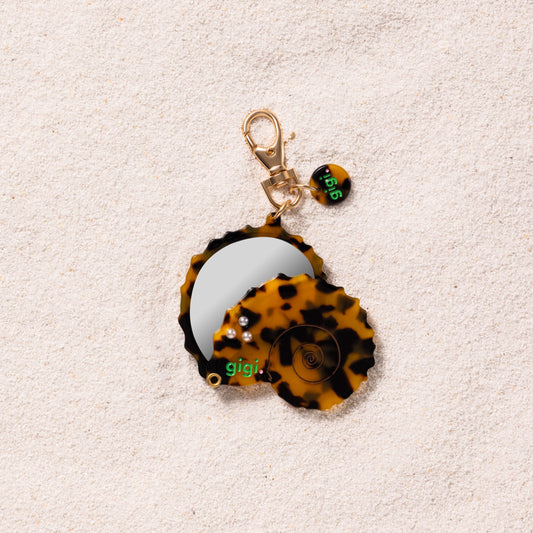 Porte-clef miroir coquillage ondine